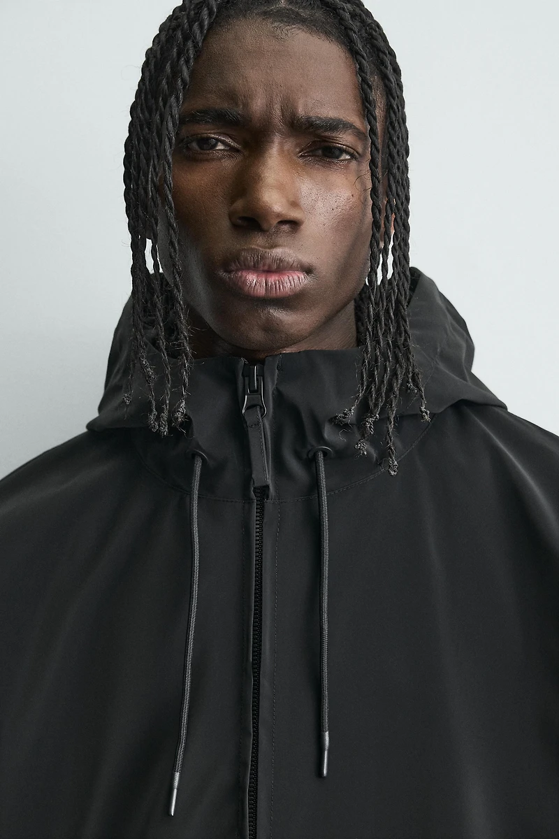 LIGHTWEIGHT HOODED TECHNICAL JACKET