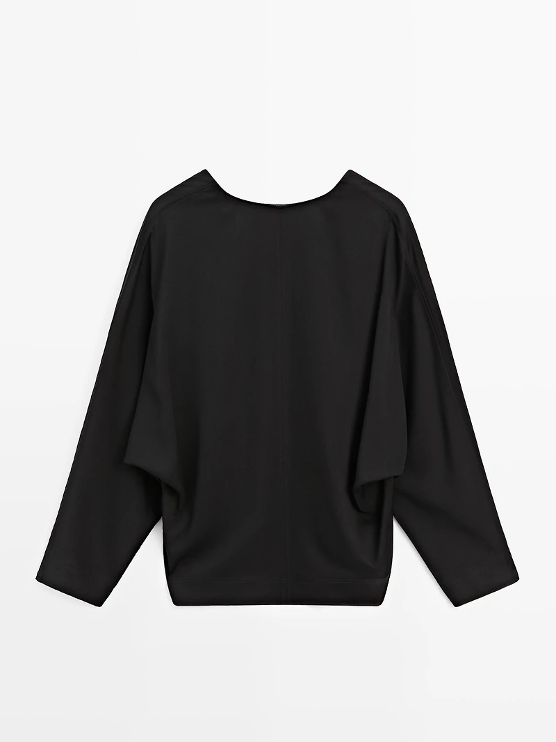 Flowing blouse with V-neckline