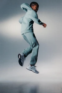 SPORTY JOGGER PANTS WITH RUBBERIZED LABEL