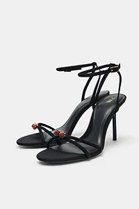 BEADED CROSSED STRAP SANDALS