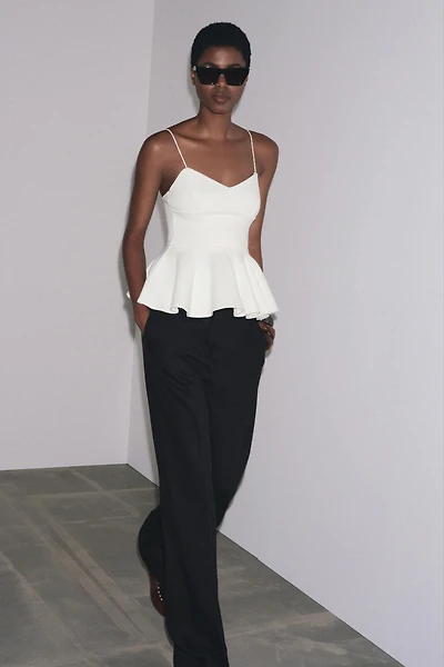 INTERLOCK PEPLUM STRAPPY TOP