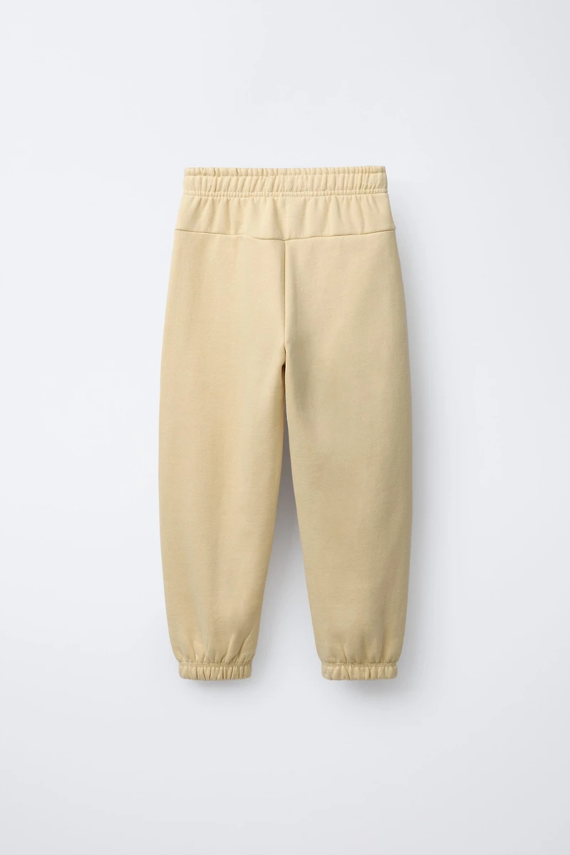 JOGGING PANTS WITH TEXT PRINT