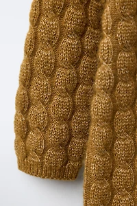 COMBINAISON LONGUE EN MAILLE TORSADÉE