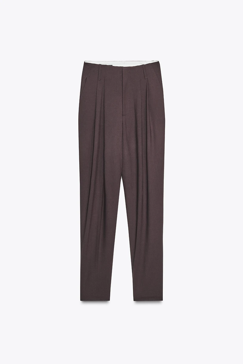 PLEATED PANTS WITH BUTTON HEM