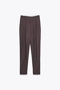 PLEATED PANTS WITH BUTTON HEM