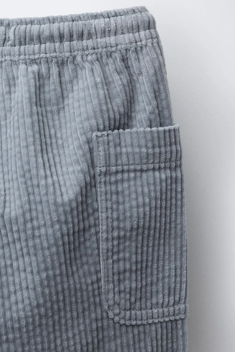 PANTALON EN VELOURS CÔTELÉ À POCHES