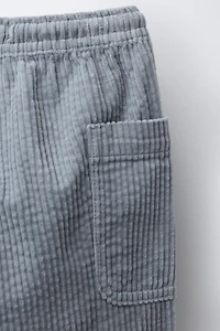 PANTALON EN VELOURS CÔTELÉ À POCHES