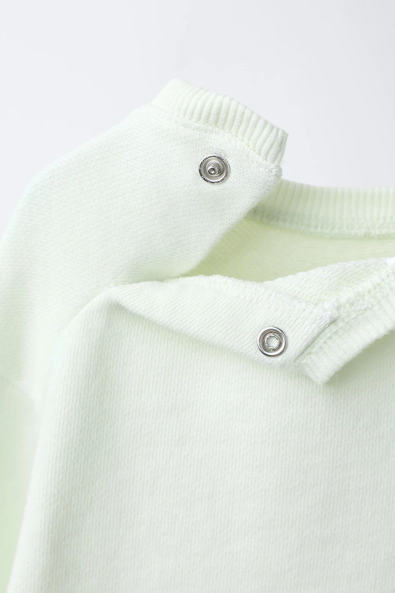 EMBROIDERED CHICK SWEATSHIRT