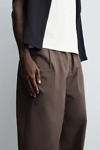 PANTALON BALLON À PLIS