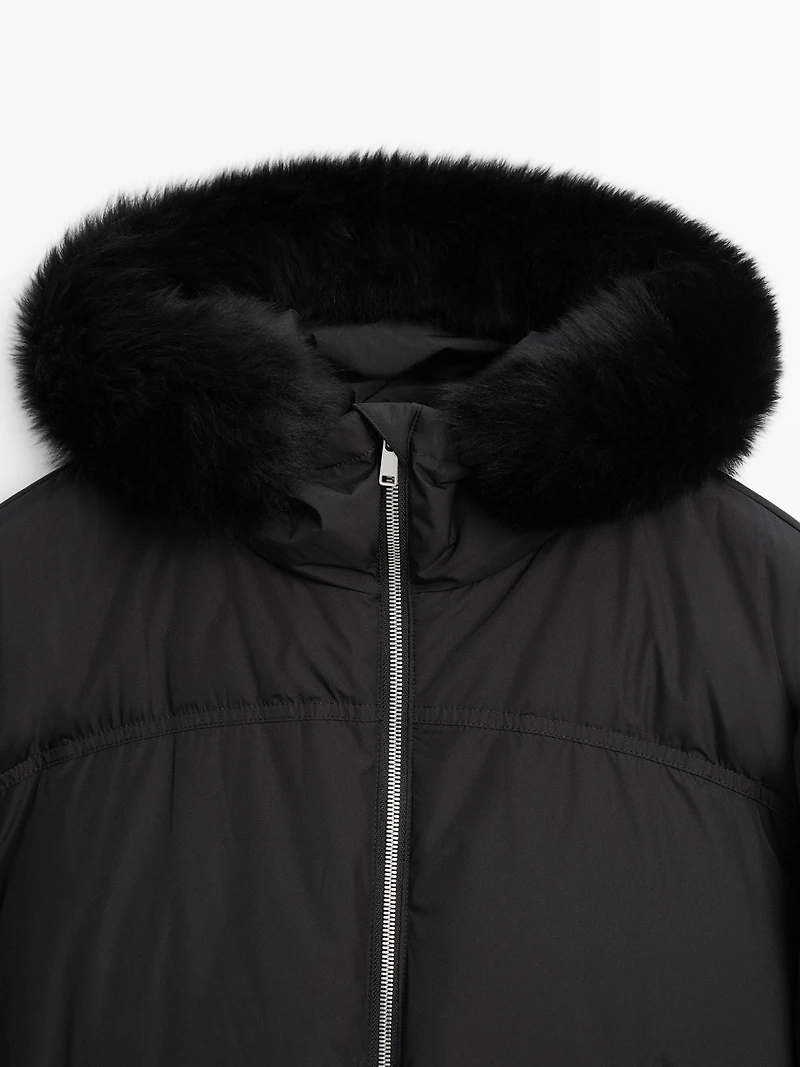 Technical down jacket with faux fur hood