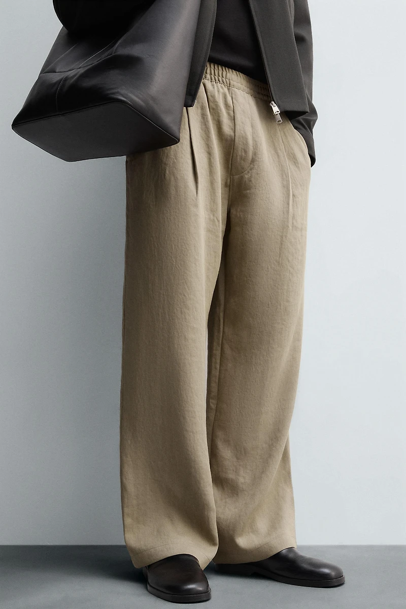 FLOWY PLEATED PANTS