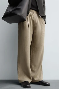 FLOWY PLEATED PANTS