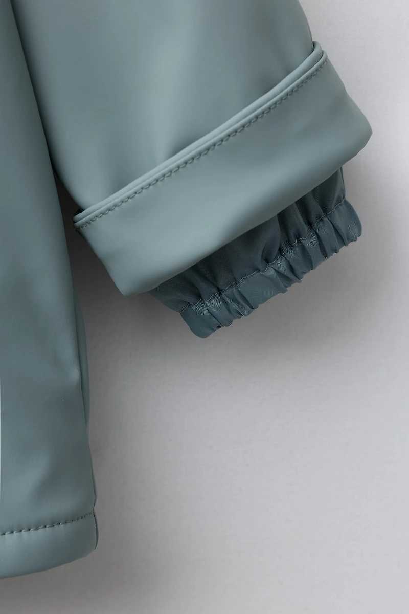 BLOUSON GOMMÉ DÉPERLANT