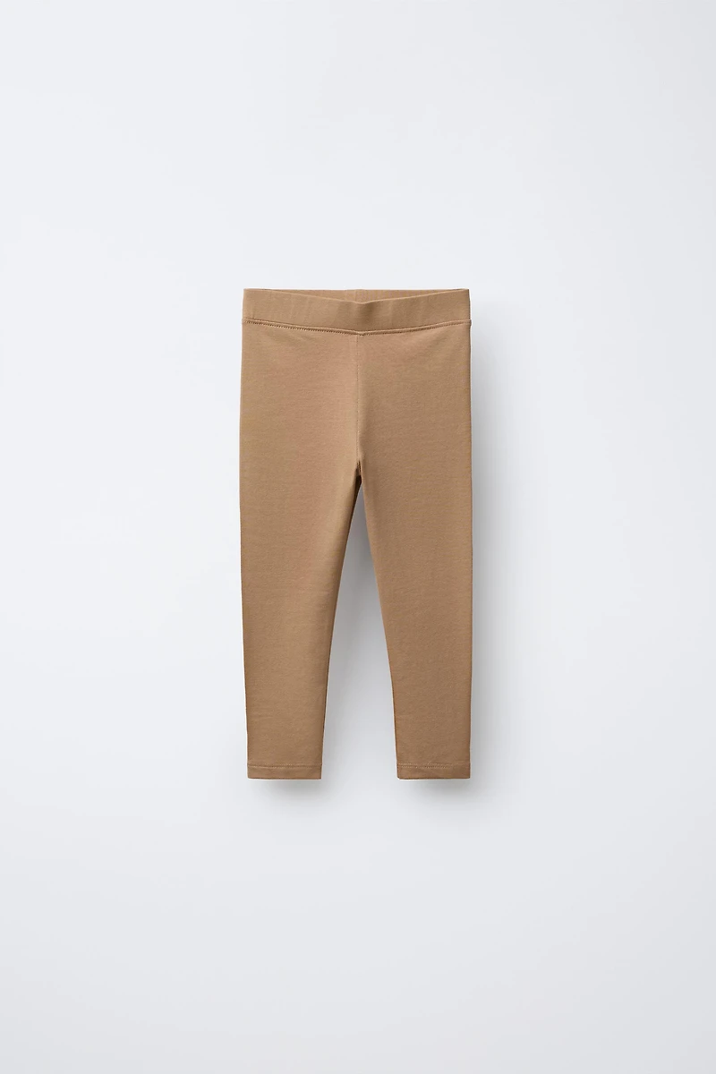LOT DE DEUX LEGGINGS UNIS ET IMPRIMÉS