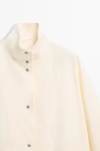 Bomber jacket with snap buttons