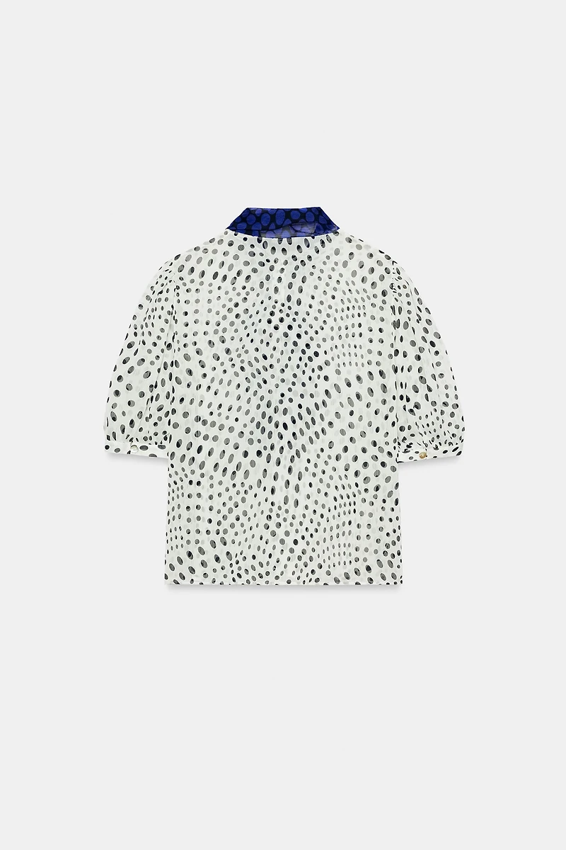 BLOUSE À POIS ET NŒUD CONTRASTANT