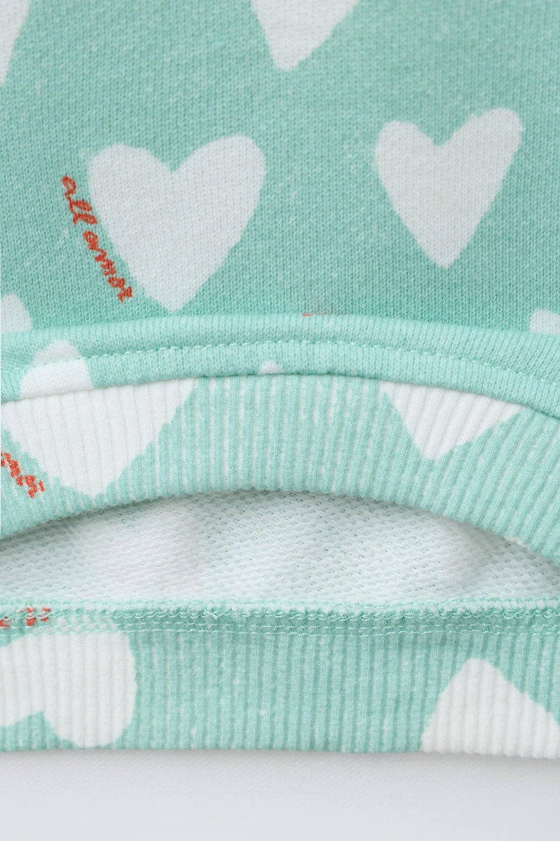 HEART PRINT SWEATSHIRT
