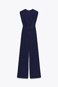 LONG DRAPED SHOULDER PAD JUMPSUIT