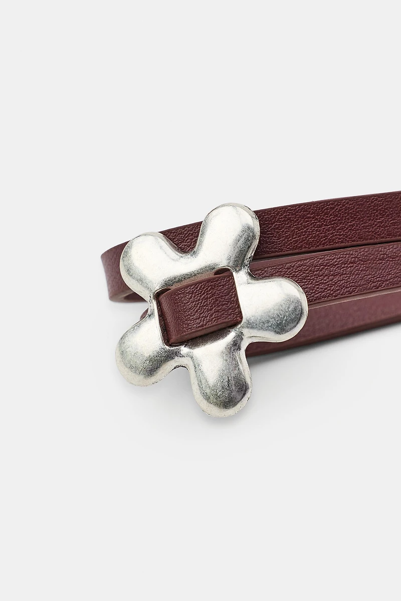 CEINTURE DOUBLE MATIÈRE SYNTHÉTIQUE FLEURS