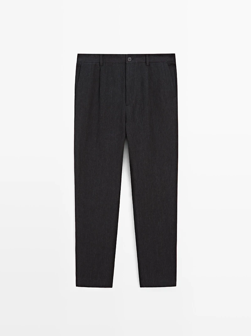Total look linen trousers with flecked detail