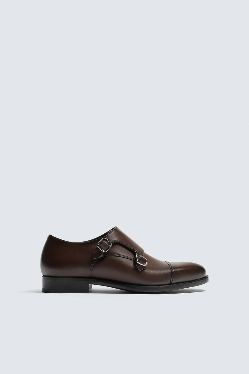 CHAUSSURES EN CUIR DOUBLE BOUCLE