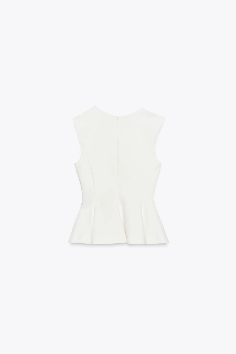 SLEEVELESS INTERLOCK PEPLUM TOP