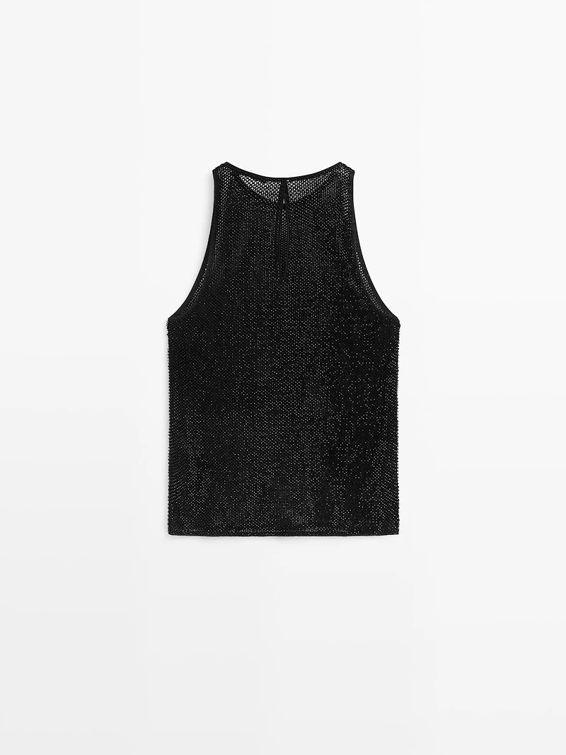 Semi-sheer top with matching beads