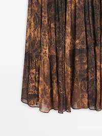 Flowing asymmetric midi skirt