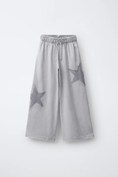 WASHED EFFECT STAR WIDE LEG PANTS