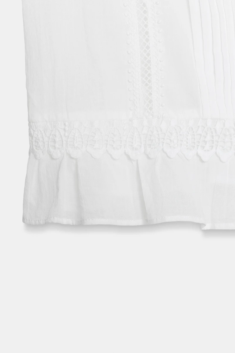 BLOUSE ENTRE-DEUX ET VOLANTS