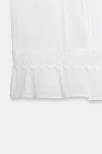 BLOUSE ENTRE-DEUX ET VOLANTS