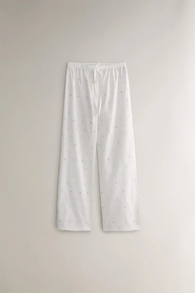 EMBROIDERED PANTS WITH LILIES