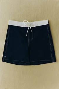 SHORT DE BAIN MI-LONG À COUTURES