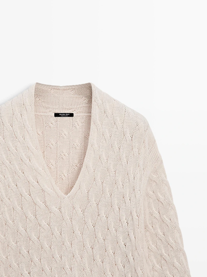 Cotton blend knit sweater with knot details