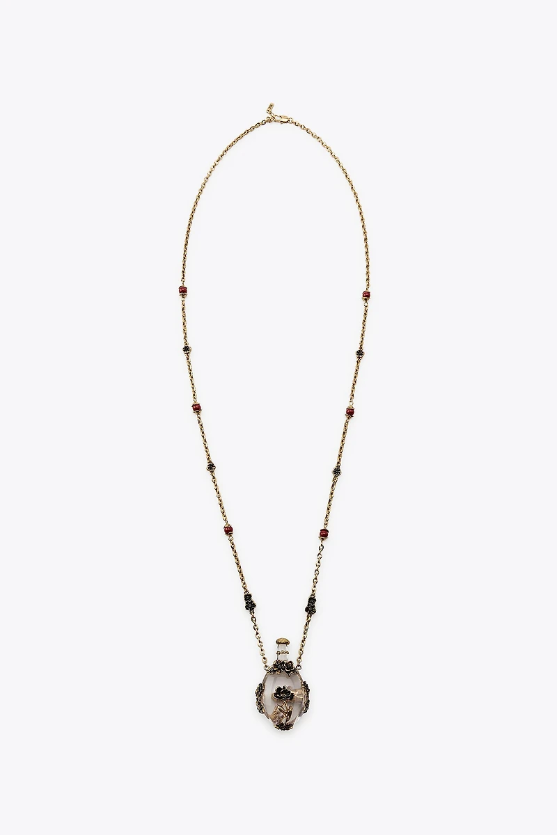 METAL FLOWER BOTTLE NECKLACE