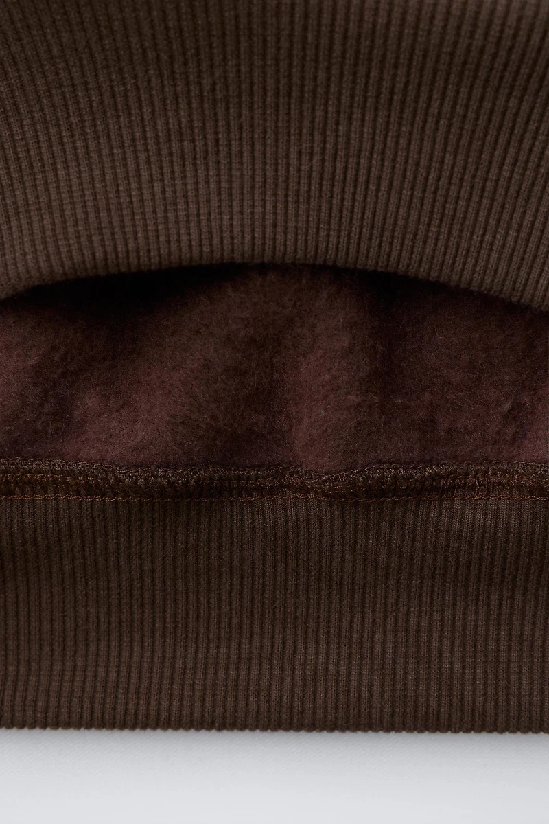 THE GRINCH ™ DR. SEUSS ENTERPRISES © PRINTED SWEATSHIRT