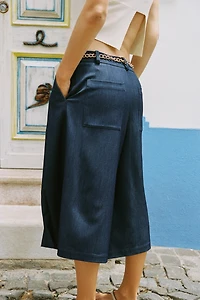 BELTED CHAIN LONG SHORTS