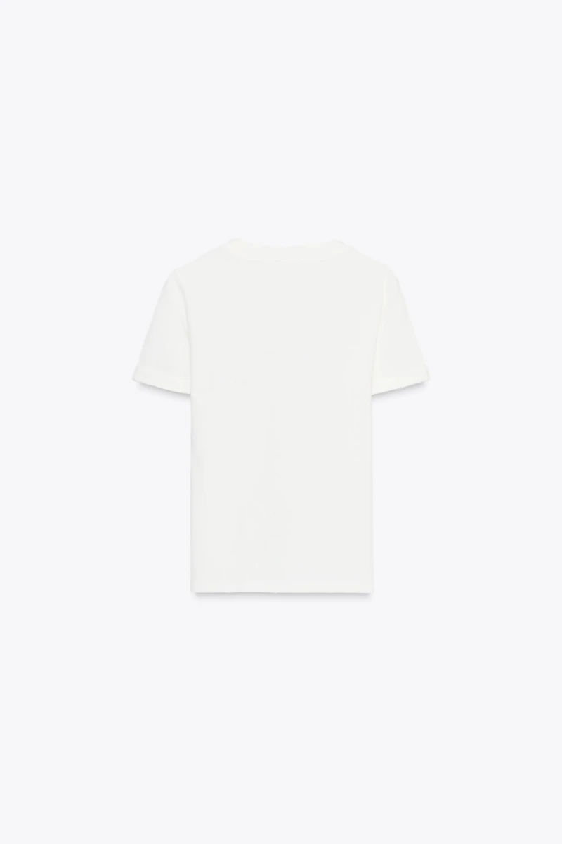 COTTON T-SHIRT WITH TEXT AND RIPS