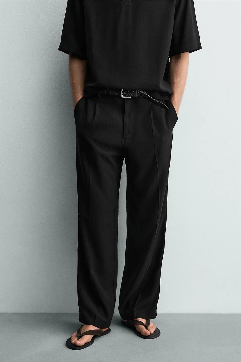 FLOWY RELAXED FIT PLEATED PANTS