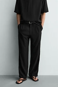 FLOWY RELAXED FIT PLEATED PANTS