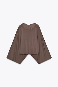 ASYMMETRIC FLOWY CAPE