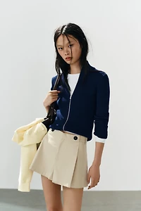 PLEATED BUTTON SHORTS