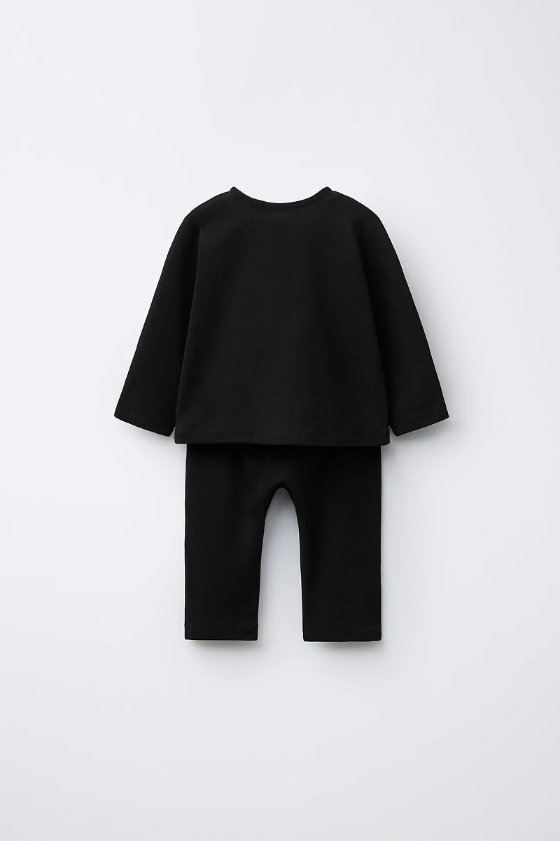 ENSEMBLE T-SHIRT À COL TUNISIEN ET PANTALON UNI