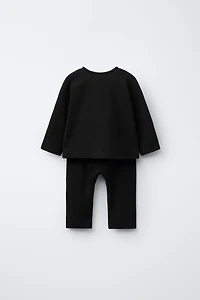 ENSEMBLE T-SHIRT À COL TUNISIEN ET PANTALON UNI