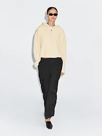 Wool blend sweater with hood detail