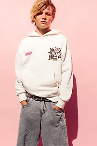 DENIM SHORTS WITH STAR AND TEXT