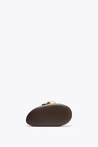 METALLIC CLOSURE CLUTCH