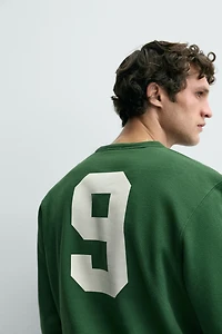 COMBINATION PRINT SWEATSHIRT