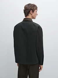 Veste avec col en cuir