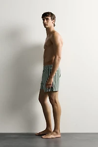 STRIPED MID-LENGTH SWIM SHORTS
